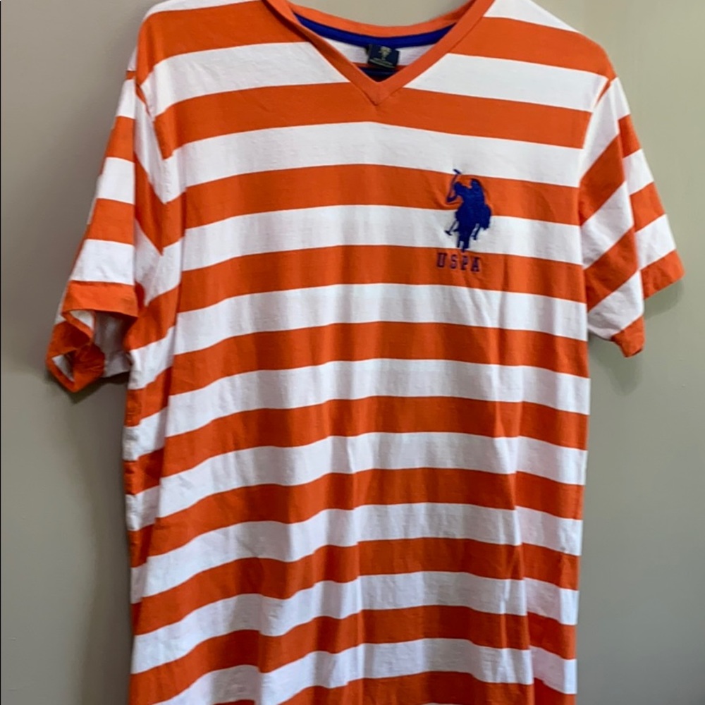 Polo shirt size large. Orange and white